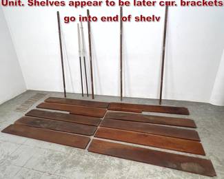 Lot 886 Mid Century Modern Wall Shelving Unit. Shelves appear to be later cur. brackets go into end of shelv