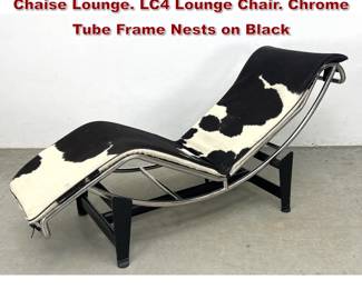 Lot 855 Le Corbusier style Cow Hide Sling Chaise Lounge. LC4 Lounge Chair. Chrome Tube Frame Nests on Black 