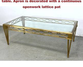 Lot 781 French Style Brass and Glass Coffee table. Apron is decorated with a continuous openwork lattice pat