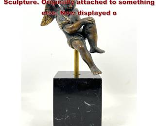 Lot 636 Metal Winged Angel, Cherub Figural Sculpture. Originally attached to something else. Now displayed o