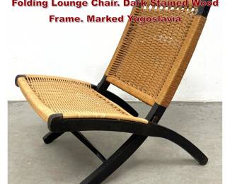 Lot 822 Hans Wegner style Woven Rope Folding Lounge Chair. Dark Stained Wood Frame. Marked Yugoslavia