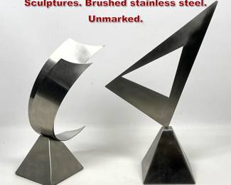 Lot 712 2pcs Abstract Modern Table Sculptures. Brushed stainless steel. Unmarked.