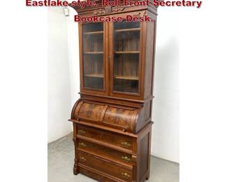 Lot 1605 Late 19th Century Victorian Eastlake style. Roll Front Secretary Bookcase Desk.