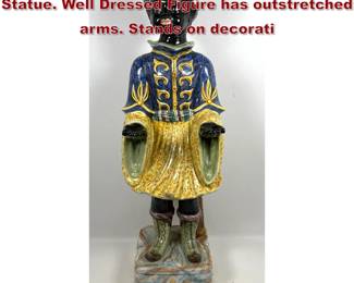 Lot 1329 37 Majolica Blackamoor Figure Statue. Well Dressed Figure has outstretched arms. Stands on decorati