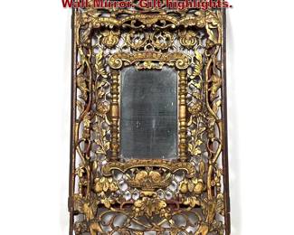 Lot 1537 Intricate East Asian Carved Wood Wall Mirror. Gilt highlights.