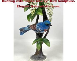Lot 1411 ROYAL WORCESTER Bisque Lazuli Bunting with Choke Cherry Bird Sculpture. Elegant Naturalistic form.