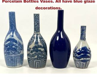 Lot 1544 Collection 4 Long Necked Asian Porcelain Bottles Vases. All have blue glaze decorations.