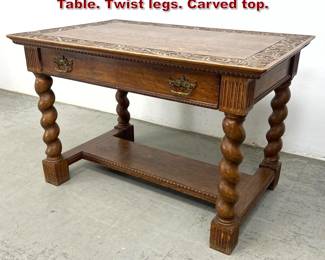 Lot 1634 Antique Carved Oak Library Desk Table. Twist legs. Carved top.