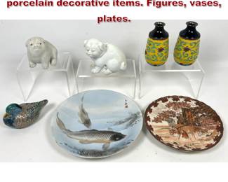 Lot 1567 7pcs East Asian ceramic and porcelain decorative items. Figures, vases, plates.