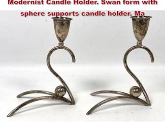 Lot 1384 Pr Sterling Silver Mexican Modernist Candle Holder. Swan form with sphere supports candle holder. Ma
