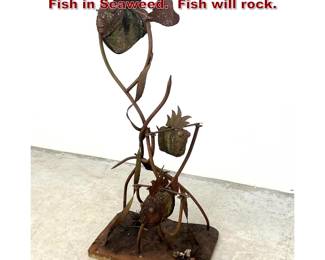 Lot 1223 Iron and Stone Garden Sculpture of Fish in Seaweed. Fish will rock.