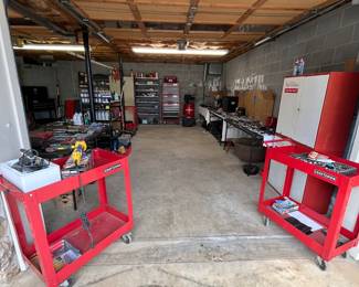 This Garage and work shop is full of tools and equipment