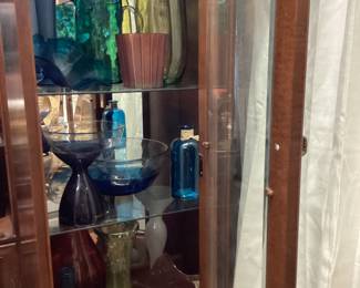 assorted colored glassware. many pieces hand blown