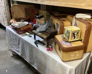 Vintage toys and luggage