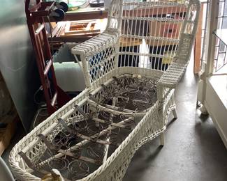Antique wicker chaise with coil springs