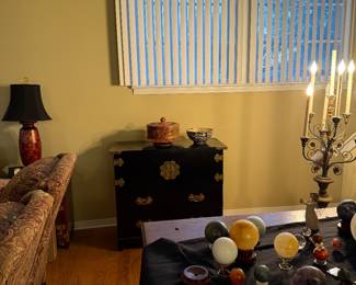 $425 Black lacquer cabinet Asian style.