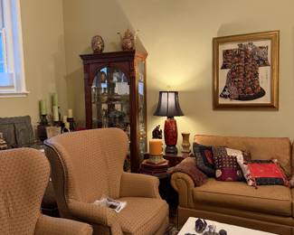 Wing back chairs $250 each.  Sofa $250.  Tall glass front $400. Framed kimono art with red artist stamp. m$150 each