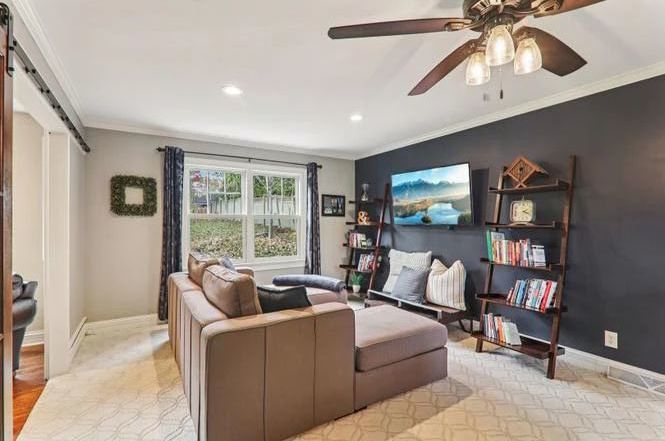 Lovesac Sectional in Gray - Bookladders - Samsung TV all ready off the wall.