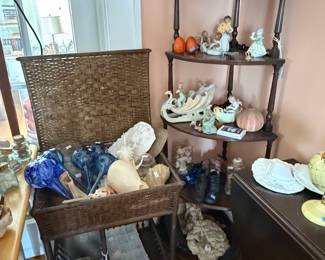 Wicker Plant Stand with Blue and White Glass Vases