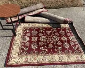 4 Area Rugs Including A Small End Table