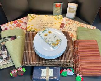 Assortment of placemats and napkins plus charger plates