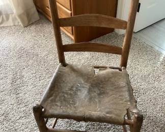 Antique cowhide chair