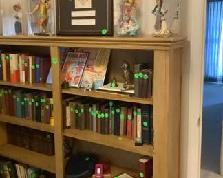 Bookcases with more folks and some great Christian books, first edition books.