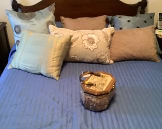 Full picture of full bed with decorative pillows and decoupage purse. So 60’s and 70’s.