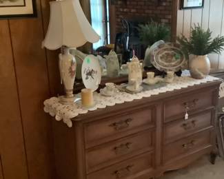 Full view is dresser in den. Matches furniture in one of the bedrooms .