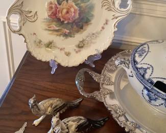 Beautiful China plate on stand with silver tray and blue and white turrain