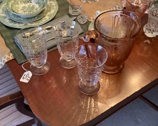 Crystal on table with Pink depression pitcher.
