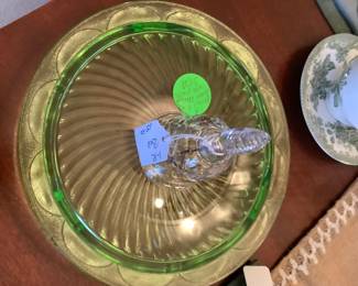 Green cake stand with crystal bell.