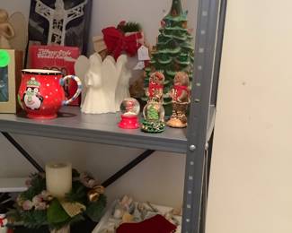 Christmas items in storage on side of car port.