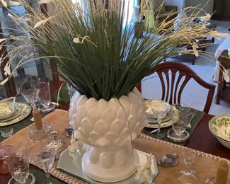 A picture of the gorgeous center piece on table along with the pewter rabbits and porcelain little rabbits.