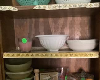 Some of the Pyrex bowls with some Tupperware bowls.