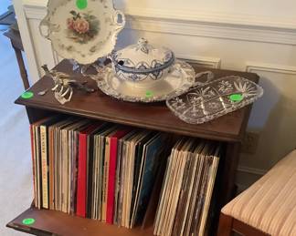 Record holder in dining room. It closes up, so it looks like a solid cabinet. Yes, we have the record player with speakers to play them.