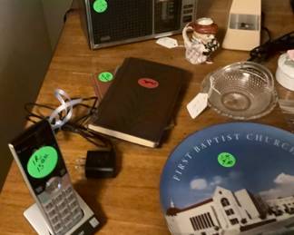 Another old radio along with other items on desk.