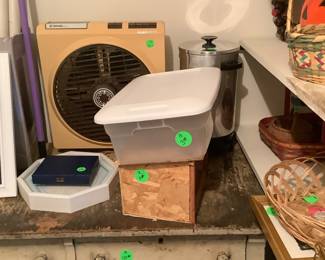 Fan and a old antique chest waiting for some love.