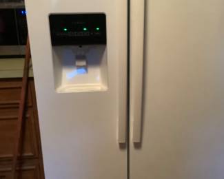 Showing the water dispenser on refrigerator.