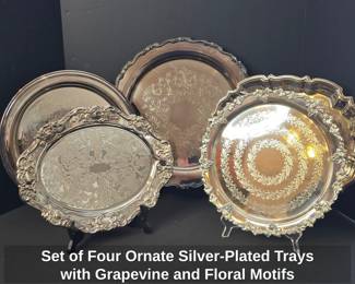 Set of Four Ornate SilverPlated Trays with Grapevine and Floral Motifs