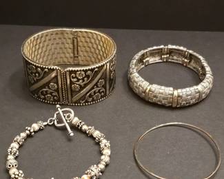 Lot of Four Bracelets Embossed Cuff, Woven Stretch, Beaded Toggle, and Star Charm Bangle