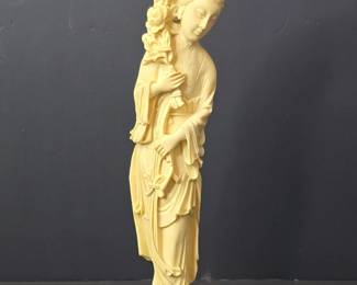 Faux Carved Ivory Figurine of a Woman with Flowers