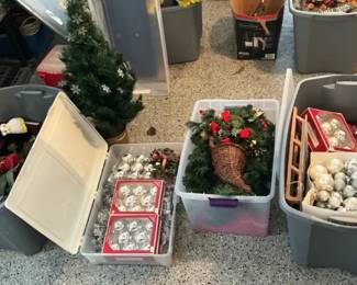 Assortment of Christmas Decorations and Small Tree