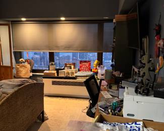 Office room filled with lots of treasures- antique dolls, office supply, home decor, furniture, bedframe, storage, carpets, men and womens clothing