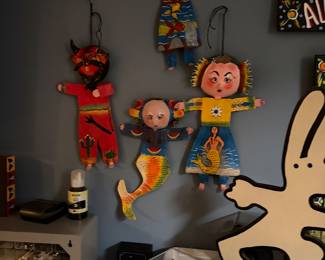coconut dolls due to their paper mache or coconut shell faces, are primarily used as decorative wall hangings. 