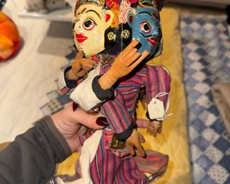This image shows a vintage, handmade two-faced puppet, likely of Nepalese or North Indian origin, dating from around the 1980s. 