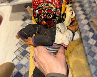 This image shows a vintage, handmade two-faced puppet, likely of Nepalese or North Indian origin, dating from around the 1980s. 