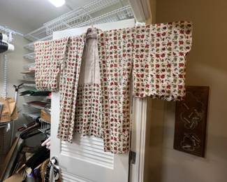 This item is a vintage Japanese Haori jacket, typically worn over a kimono as a coat or cardigan. It features traditional floral or leaf patterns and is often lined. 