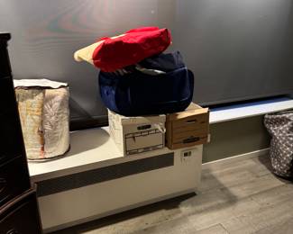 Room filled with both women and mens clothing, furniture, home decor and more!