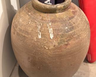 ntique Japanese stoneware jar, likely from the Shigaraki or Tamba regions, traditionally used for storing tea leaves or other foods